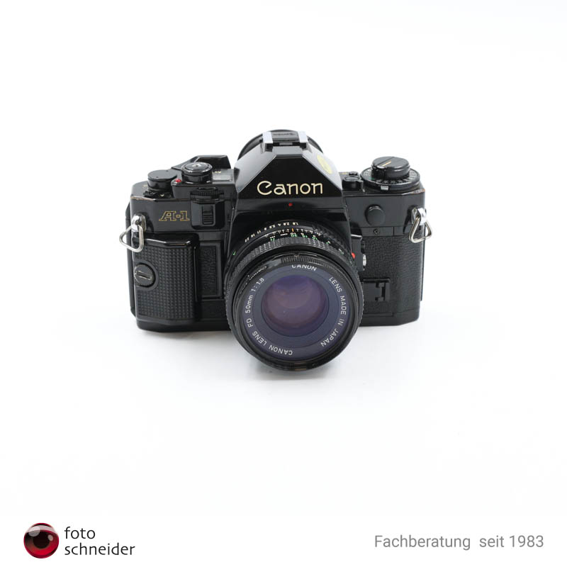 HE4A1799-17 Gebraucht: Canon A-1 + 50mm F1,8 - SN.: 1964649